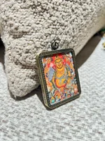 Handcrafted Yellow Jambhala Pendant Necklace – Tibetan Buddhist Artwork, Spiritual Wealth Amulet, Tibetan Jewelry - Image 2