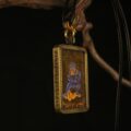 The Black Jambhala Amulet: Hand-Painted Tibetan God of Wealth Pendant (Silver-Clad Copper) - Image 4