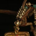The Enchanting Kitsune: Sleeping Fox Spirit Locket | Hand-Painted Crystal & Gold Love Talisman - Image 3