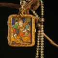 The "Sovereign of Wealth": Yellow Jambhala Thangka Locket | Ultimate Prosperity (Red Lotus Edition) - Image 2